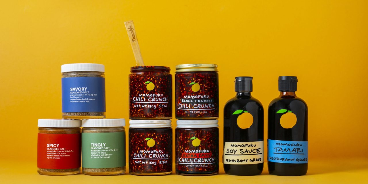 Momofuku's line of pantry products, including bottles of chili crunch and soy sauce