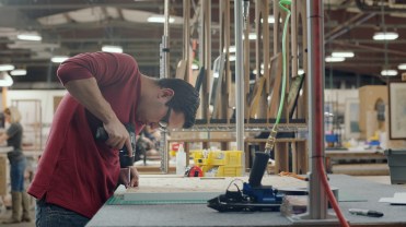 Employee at picture frame company Framebridge's factory