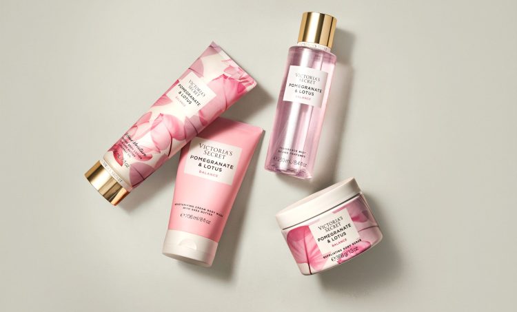 Victoria's secret beauty items on a tan background
