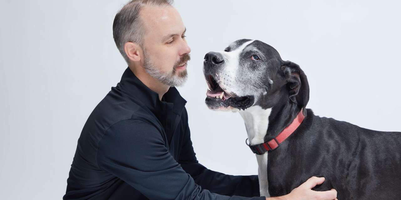 Bark CEO Matt Meeker with his dog Hugo