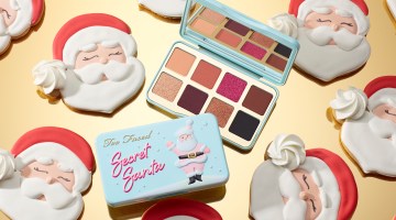 A Too Faced makeup palette is wide open.