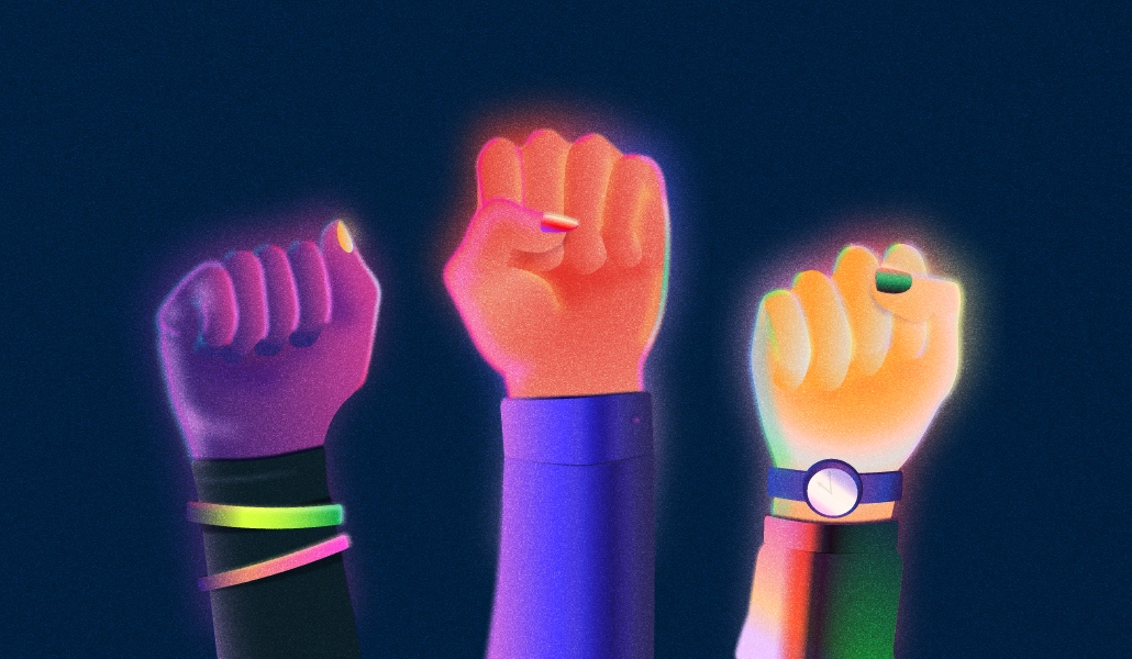 Three fists raised in solidarity with brightly colored nails on a dark navy blue background