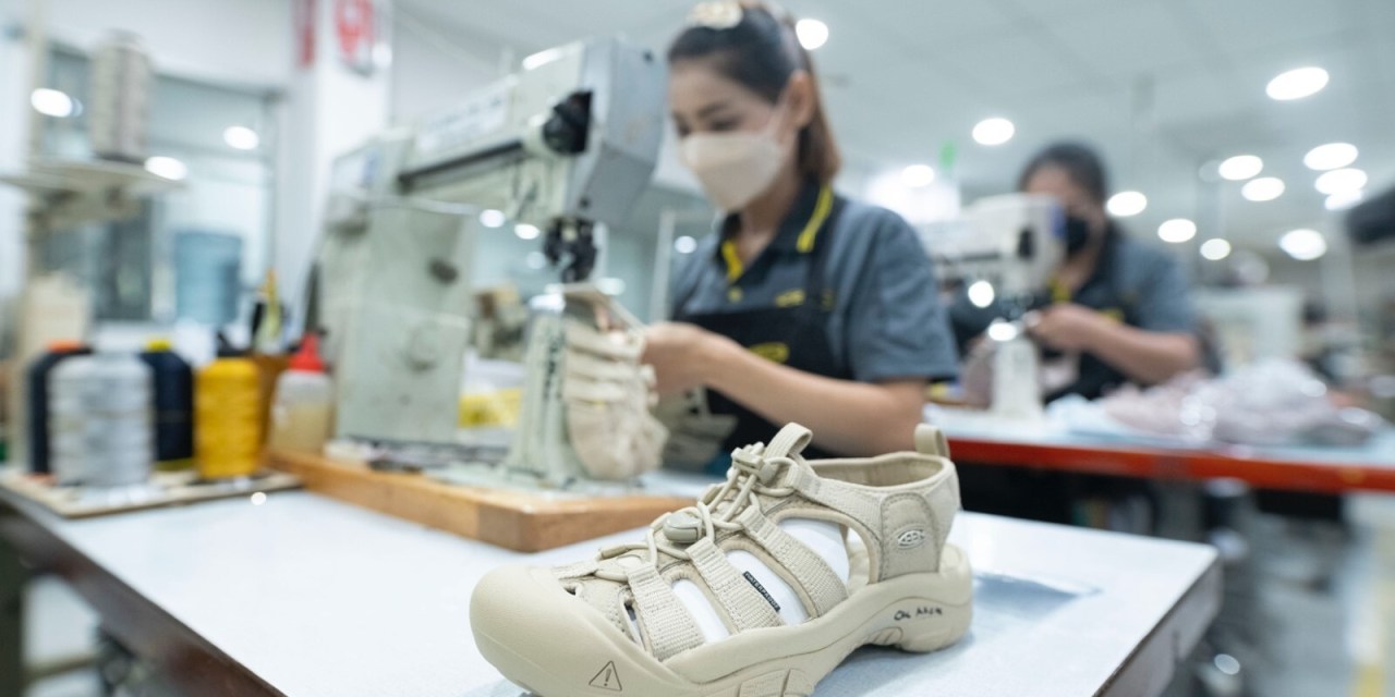 A Newport shoe from Keen sits on a table in their factory.