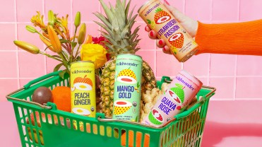 Wildwonder's products in a shopping basket with fruits.