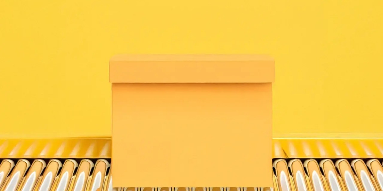 Yellow box on an assembly line, sitting on a yellow background