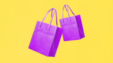 Illustration of two paper shopping bags.
