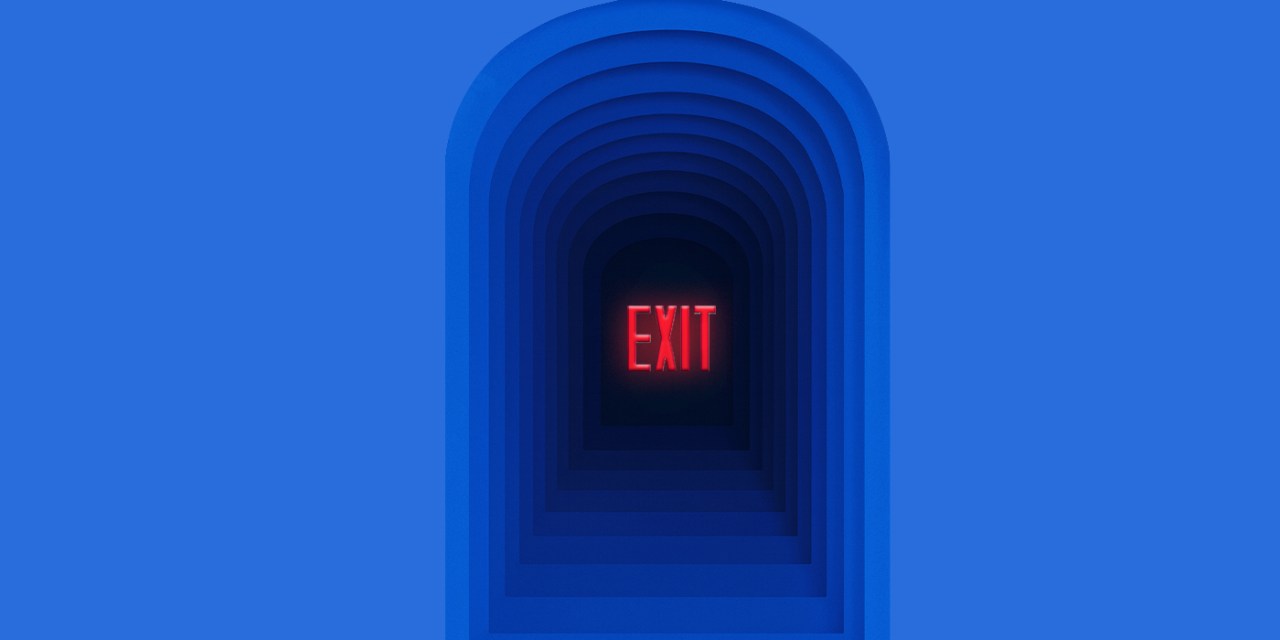 Dark archway with the word 'Exit' written in all caps in the middle.